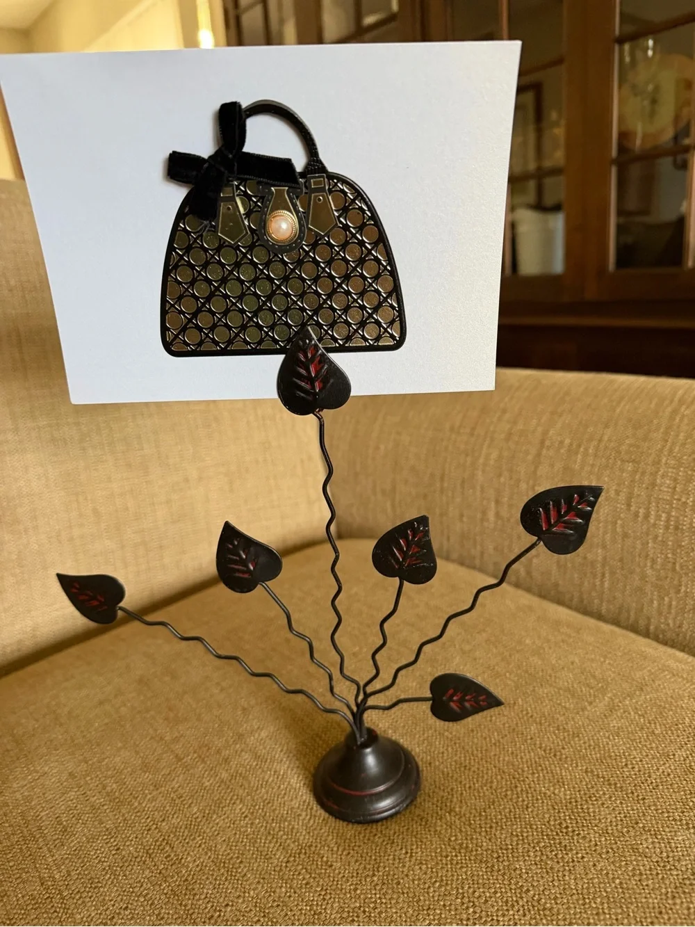 Black Metal Leaf Table Decor with Red Accents